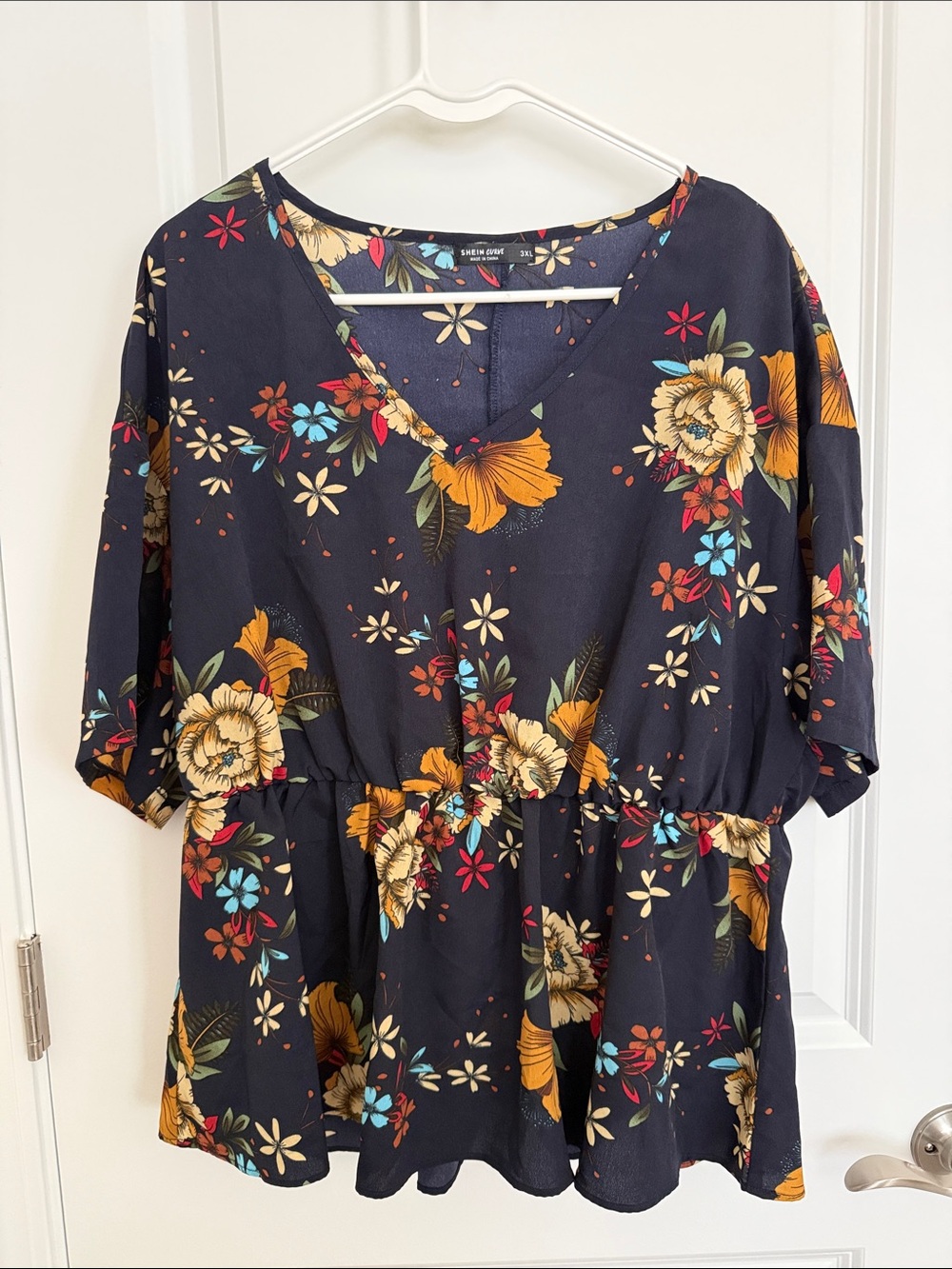 Navy Floral V-Neck Peplum Blouse